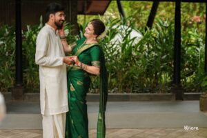 Candid photography of bride and groom sharing a natural smile during wedding photoshoot in Kerala
